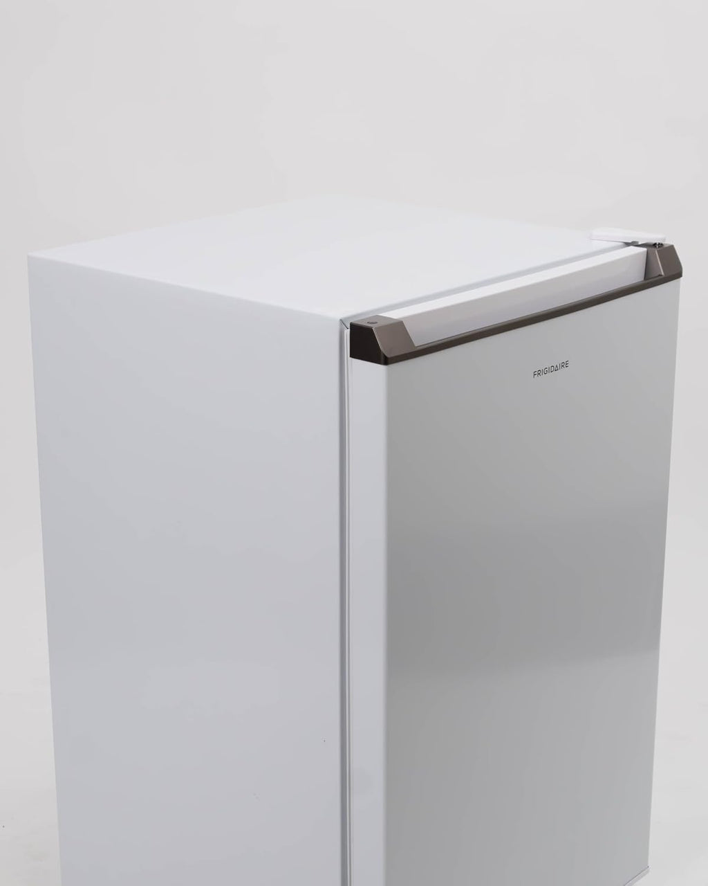 Frigidaire Mini Refrigerator, Compact Freezer Compartment, Adjustable Thermostat Control, Reversible Door, Contemporary Series, 4.5 cu ft, White