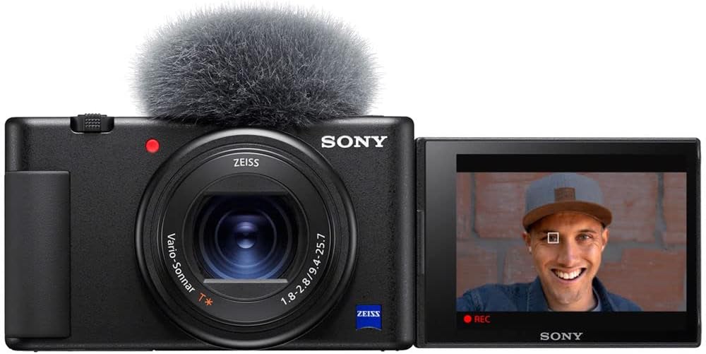 Sony ZV-1 Digital Vlogging Camera Black (DCZV1/B) – 20.1 MP 1' Sensor, 24–70 mm ZEISS Lens, 4K HDR Video, Flip Screen w/ 64GB Card, Deluxe Soft Bag, Flex Tripod, Memory Card Wallet, Cleaning Kit