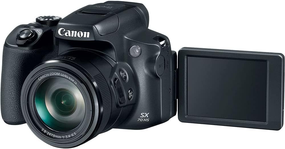 Canon PowerShot SX70 HS Digital Camera (3071C001) + 64GB Card + Corel Photo Software + 2 x LPE12 Battery + External Charger + Card Reader + LED Light + HDMI Cable + Deluxe Soft Bag + More