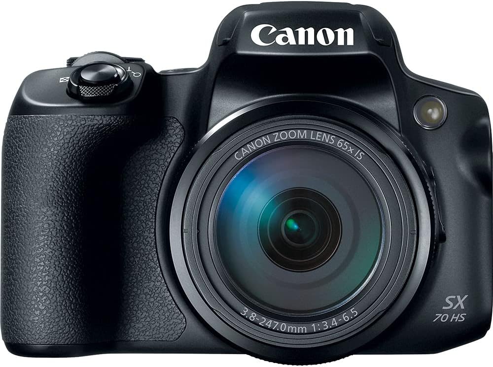 Canon PowerShot SX70 HS Digital Camera (3071C001) + 2 x 64GB Card + Corel Photo Software + 3 x LPE12 Battery + Charger + Card Reader + LED Light + HDMI Cable + Deluxe Soft Bag + More