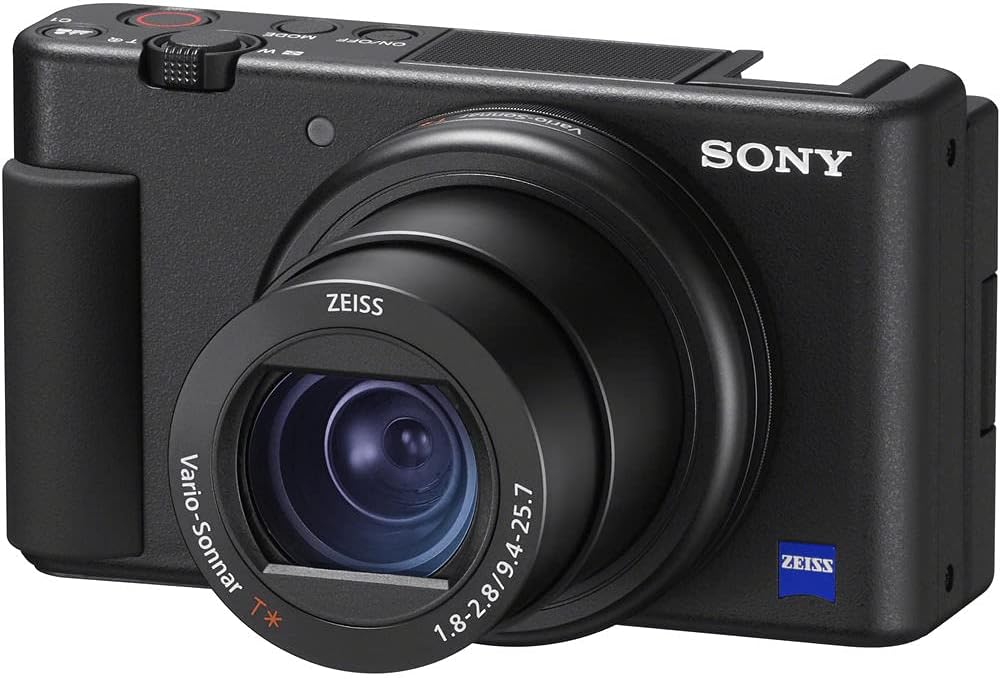 Sony ZV-1 Digital Vlogging Camera Black (DCZV1/B) – 20.1 MP 1' Sensor, 24–70 mm ZEISS Lens, 4K HDR Video, Flip Screen w/ 64GB Card, Deluxe Soft Bag, Flex Tripod, Memory Card Wallet, Cleaning Kit