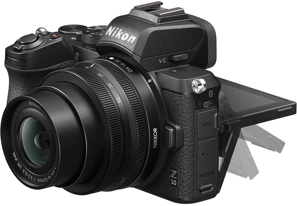 Nikon Z50 Compact Lightweight Mirrorless Camera with 16-50mm and 50-250mm Lenses + ENEL25 Replacement Battery + Extreme PRO 64GB Card+ UV Lens Filter + Photo Editing Software + More