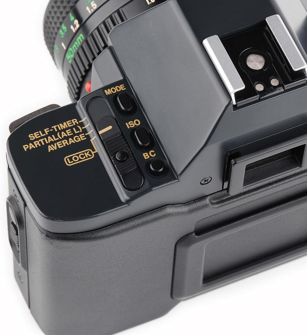 Canon T70 35MM SLR Film Camera kit With FD mount Zoom Lens Works with Color and B&W film. (Renewed)