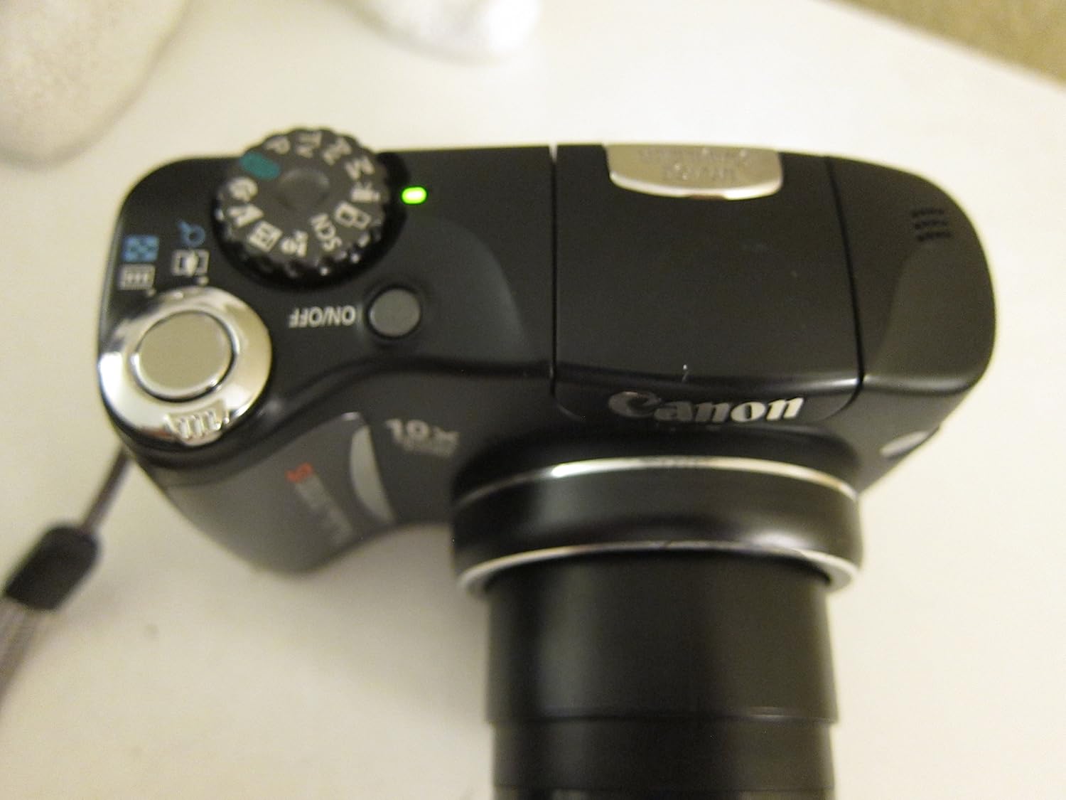 Canon PowerShot SX100IS 8MP Digital Camera with 10x Optical Image Stabilized Zoom (Black)