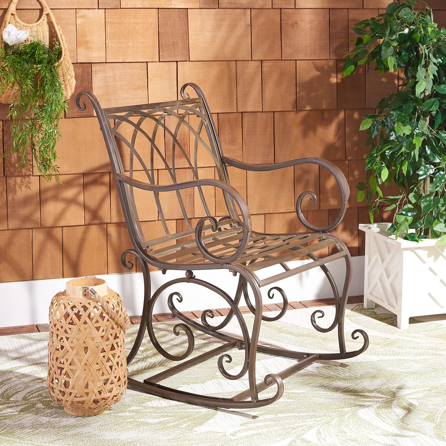 SAFAVIEH Outdoor - Medrano Iron Rocking Chair - Rustic Brown Iron Metal - Vintage Ornate Scrollwork Design - Ideal for Patio, Deck, Porch, Garden, 15' Seat Height (PAT5030B)
