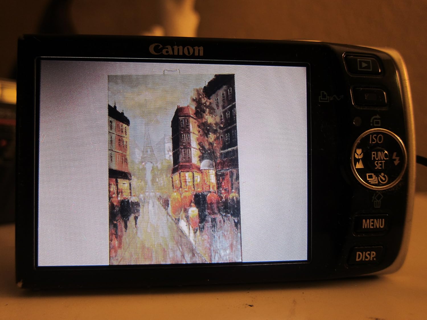 Canon PowerShot SD870IS 8MP Digital Camera with 3.8x Wide Angle Optical Image Stabilized Zoom (Black)